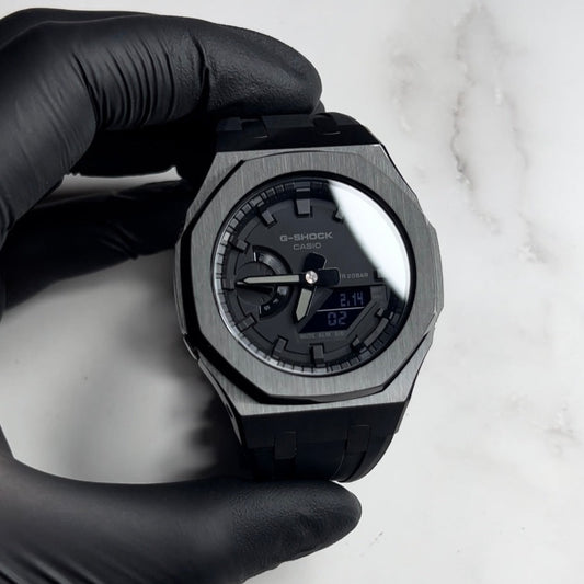 CASIOAK BLACK BEZEL ALL BLACK FACE AND BLACK RUBBER STRAP - GA 2100